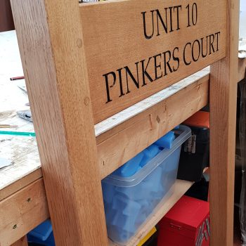 Oak parking sign with routed text